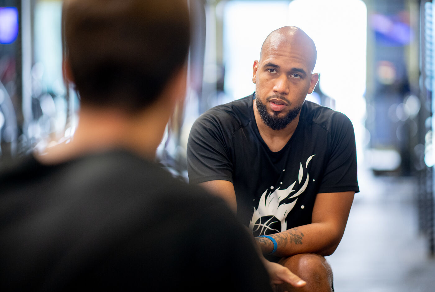 Échange individuel entre le coach In The Zone et un joueur